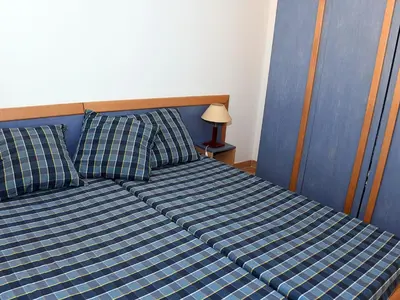 Un ou plusieurs lits dans un hébergement de l'établissement Holiday Home T3 Cabine by Interhome