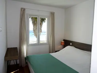 Un ou plusieurs lits dans un hébergement de l'établissement Apartment T2 vue baie by Interhome