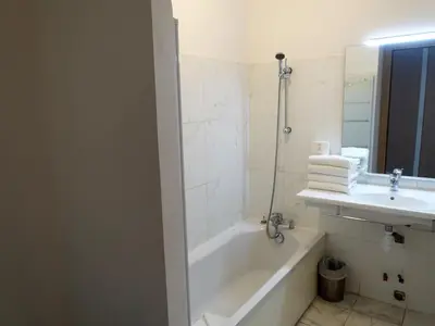 Salle de bains dans l'établissement Apartment T3 vue baie by Interhome
