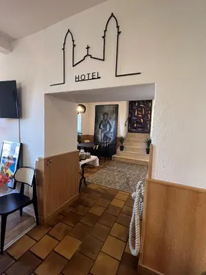 Coin salon dans l'établissement Hôtel Posta Vecchia
