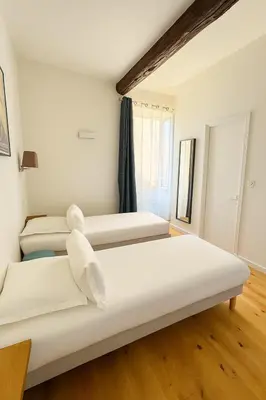 Un ou plusieurs lits dans un hébergement de l'établissement Hôtel Posta Vecchia