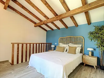 Un ou plusieurs lits dans un hébergement de l'établissement Très Beau Duplex vue panoramique Mer, Proche Plage