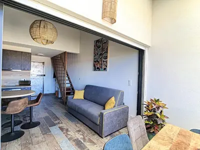 Coin salon dans l'établissement Très Beau Duplex vue panoramique Mer, Proche Plage