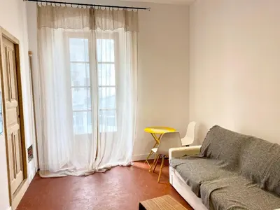 Coin salon dans l'établissement Belle chambre d hôte Et cuisine hyper centre
