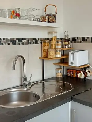 Cuisine ou kitchenette dans l'établissement Un Nid Douillet en bord de plage !!