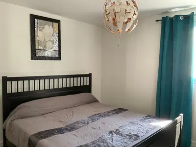 Un ou plusieurs lits dans un hébergement de l'établissement VILLA OCEANE