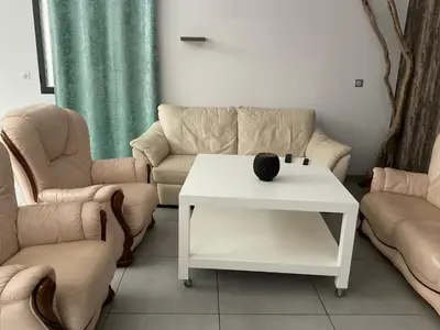 Coin salon dans l'établissement VILLA OCEANE