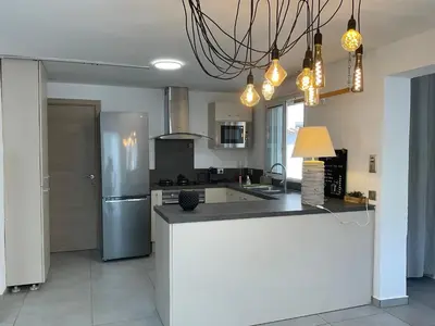 Cuisine ou kitchenette dans l'établissement VILLA OCEANE