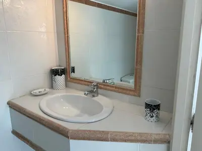 Salle de bains dans l'établissement VILLA OCEANE