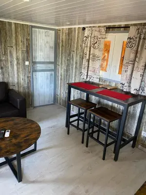 Coin salon dans l'établissement L ASCOSU