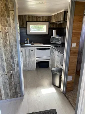Cuisine ou kitchenette dans l'établissement L ASCOSU