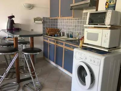 Cuisine ou kitchenette dans l'établissement Agriates