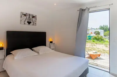 Un ou plusieurs lits dans un hébergement de l'établissement Tramontana au calme à 7 min des plages piscine partagée chauffée bbq