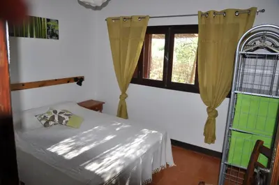 Un ou plusieurs lits dans un hébergement de l'établissement 2BA Domaine Malacucina Lumio