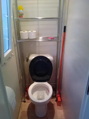 Salle de bains dans l'établissement Mobil-Home dans lotissement très tranquille