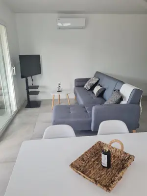 Coin salon dans l'établissement Location 