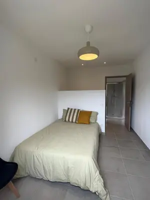 Un ou plusieurs lits dans un hébergement de l'établissement Appartement Soveria