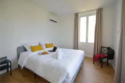 Un ou plusieurs lits dans un hébergement de l'établissement Hôtel Continental