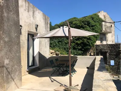 Terrasse ou espace extérieur de l'établissement Très jolie maison aux portes du Cap Corse