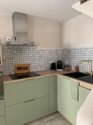 Cuisine ou kitchenette dans l'établissement Très jolie maison aux portes du Cap Corse