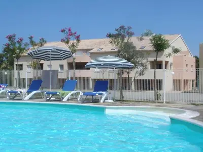 Piscine de l'établissement Appartement T2 dans résidence avec piscine ou située à proximité