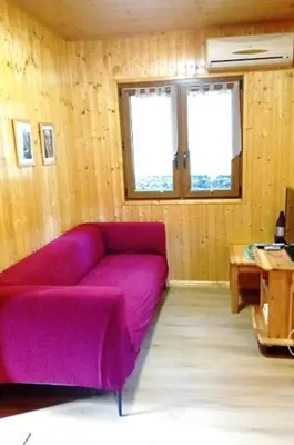 Coin salon dans l'établissement Chalet de Santa