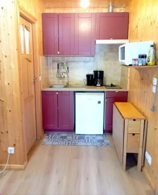 Cuisine ou kitchenette dans l'établissement Chalet de Santa