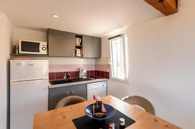 Cuisine ou kitchenette dans l'établissement Ambroggio - Grand studio avec mezzanine - Vue Mer