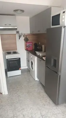 Cuisine ou kitchenette dans l'établissement Maison à 200m de la mer, 10 mn de l'aéroport de Bastia et a 20mn du port