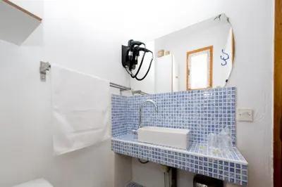 Salle de bains dans l'établissement Appartements A Merendella