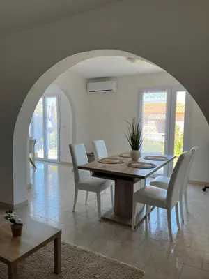 Coin salon dans l'établissement Appartement rez de villa
