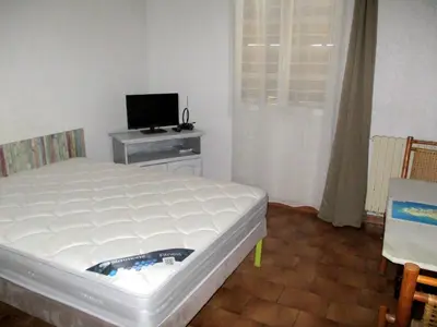 Un ou plusieurs lits dans un hébergement de l'établissement T2 Casamozza Sud de Bastia climatisé