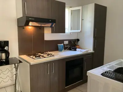 Cuisine ou kitchenette dans l'établissement MINI VILLA BORD DE MER
