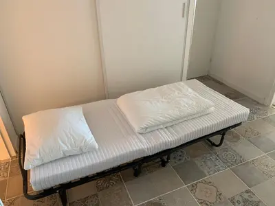 Un ou plusieurs lits dans un hébergement de l'établissement Apartment Vue Mer