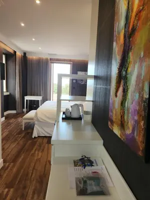 Un ou plusieurs lits dans un hébergement de l'établissement Hôtel Casale Olmia