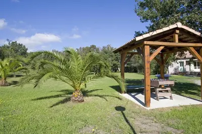 Jardin de l'établissement Residence Scopa Marina