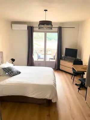 Un ou plusieurs lits dans un hébergement de l'établissement Appartements Les résidences du port La Siesta