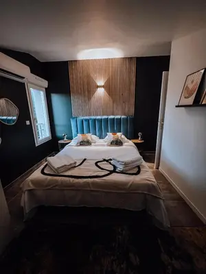 Un ou plusieurs lits dans un hébergement de l'établissement CASA GIABICONI - Villa 6pers. piscine & spa