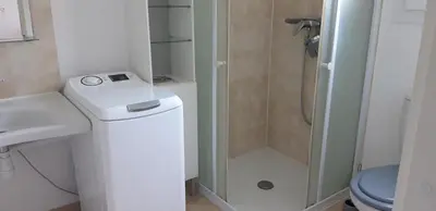 Salle de bains dans l'établissement Maison à Cervione Prunete jardin piscine accès direct plage