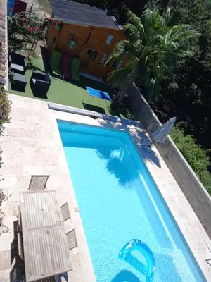 Piscine de l'établissement Casa di legnu ,charmant chalet avec piscine ou située à proximité