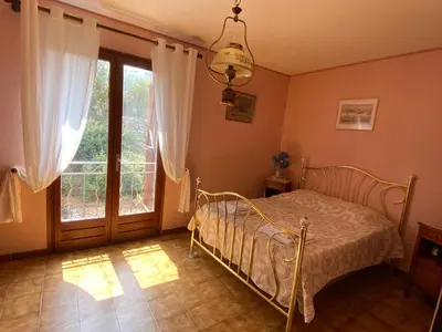 Un ou plusieurs lits dans un hébergement de l'établissement Seaview Garden Villa