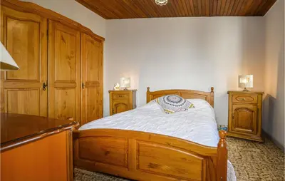 Un ou plusieurs lits dans un hébergement de l'établissement 2 Bedroom Cozy Home In San Nicolao