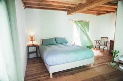 Un ou plusieurs lits dans un hébergement de l'établissement Eco lodge Carbonaccio