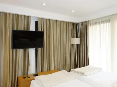 Télévision ou salle de divertissement dans l'établissement Holiday Home Villa en bois by Interhome