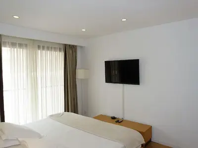 Télévision ou salle de divertissement dans l'établissement Holiday Home Villa en bois by Interhome