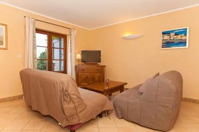 Télévision ou salle de divertissement dans l'établissement Campu Latinu