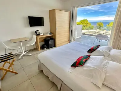 Un ou plusieurs lits dans un hébergement de l'établissement Hotel Villa R