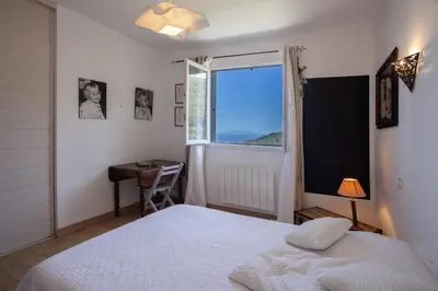 Un ou plusieurs lits dans un hébergement de l'établissement Villa Merusellu