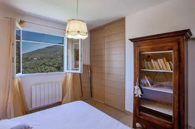 Un ou plusieurs lits dans un hébergement de l'établissement Villa Merusellu