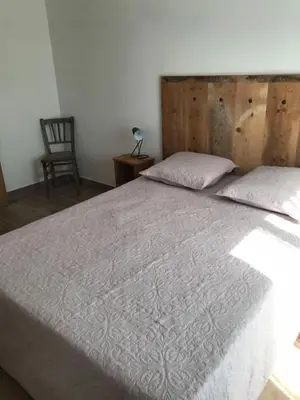 Un ou plusieurs lits dans un hébergement de l'établissement Villa Agliastru à 900m de la plage de Lozari